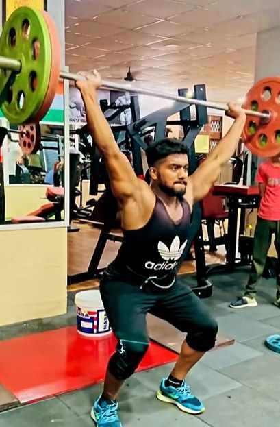 Ankit performing clean and jerk