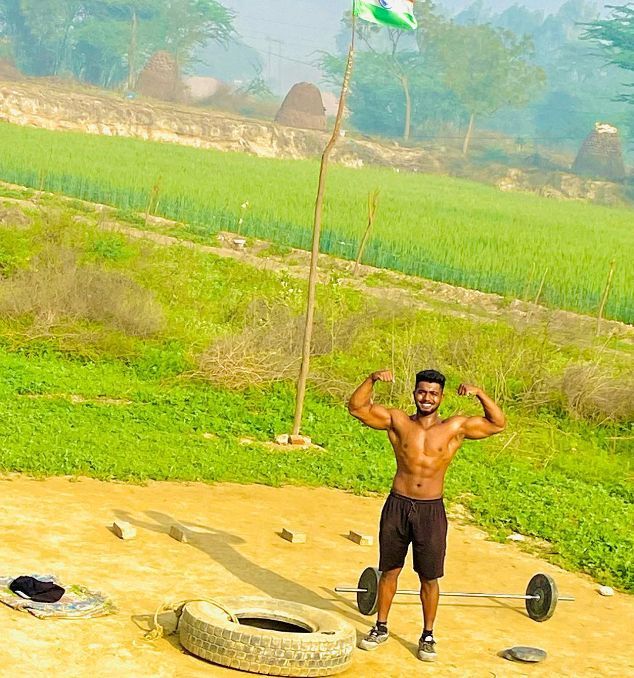 Ankit working out in the open field